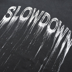 SLOWDOWN Eroded Font Black Tee