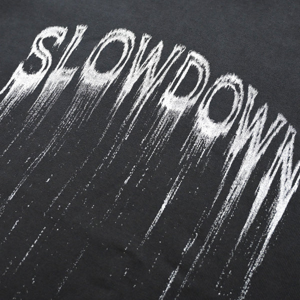 SLOWDOWN Eroded Font Black Tee