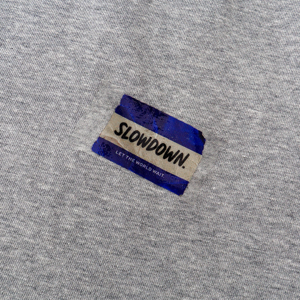 SLOWDOWN Transparent Tape Basic Grey Tee